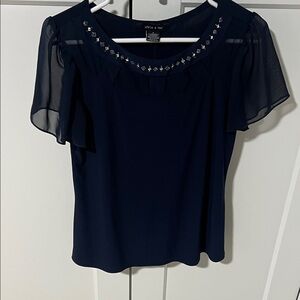 Chic Navy Blouse with Studded Neckline